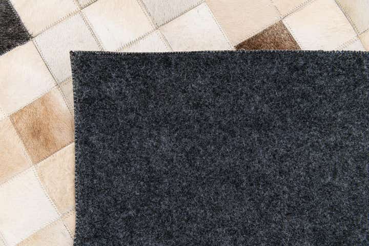 5' 1 x 7' 11 Cowhide Stocks Rug