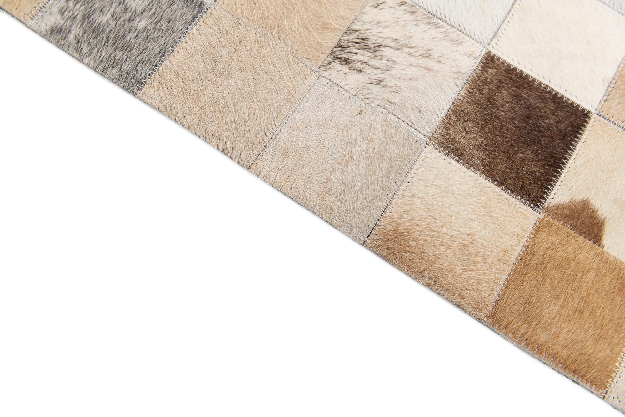 5' 1 x 7' 10 Cowhide Stocks Rug