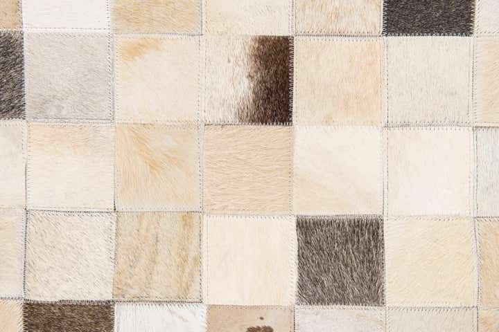 5' 1 x 7' 10 Cowhide Stocks Rug