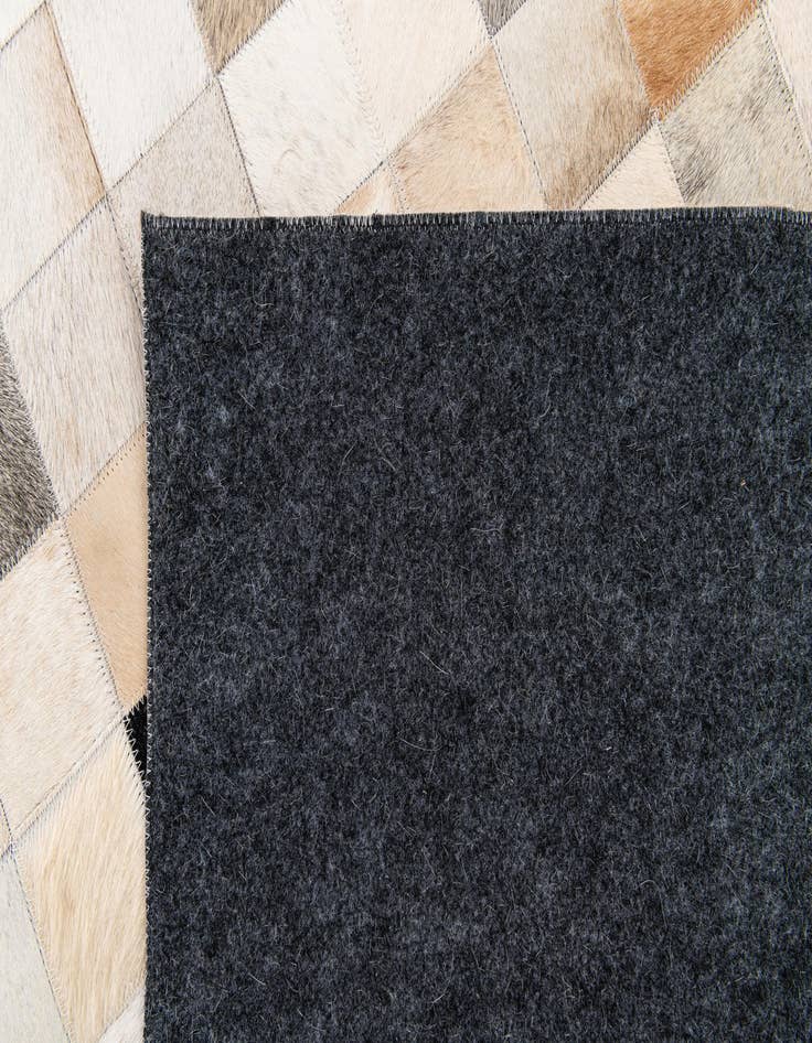 Detail image of 5' 1 x 7' 10 Cowhide Stocks Rug