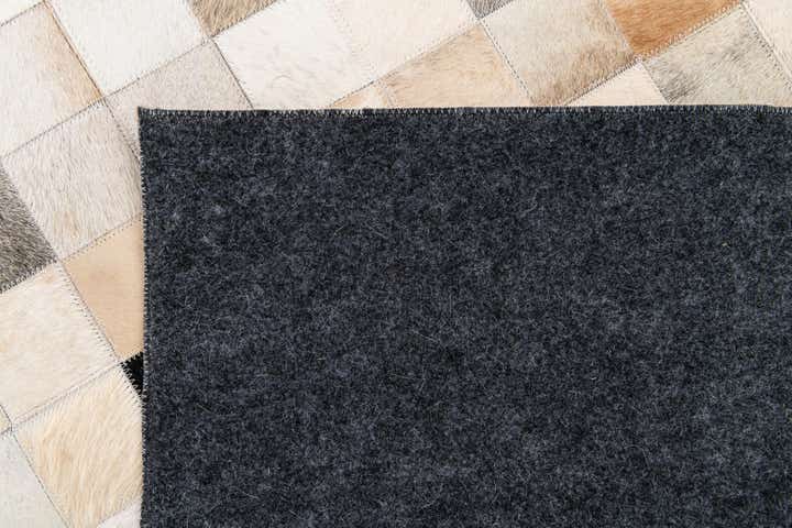 5' 1 x 7' 10 Cowhide Stocks Rug