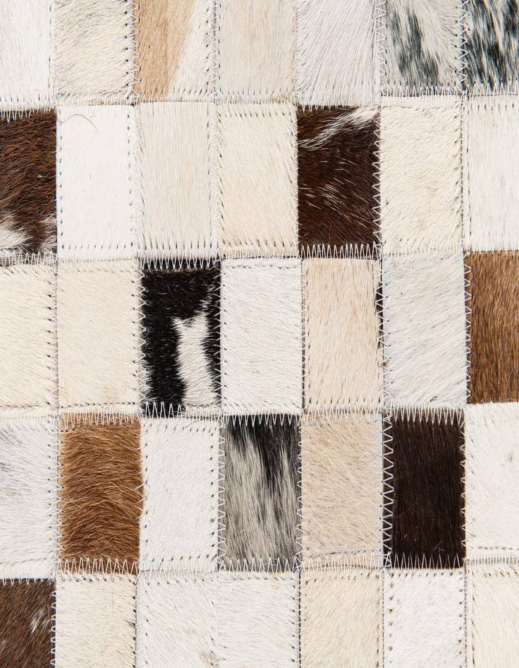 Detail image of 5' x 7' 11 Cowhide Stocks Rug