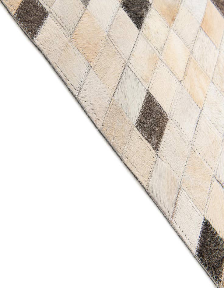 Detail image of 5' x 7' 11 Cowhide Stocks Rug