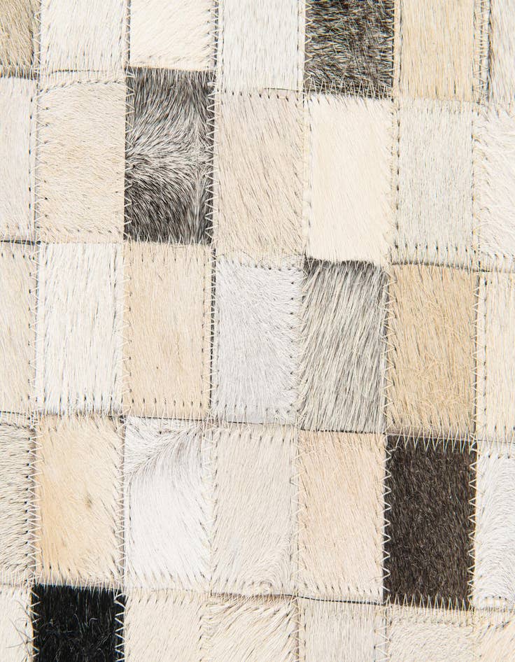 Detail image of 5' x 7' 11 Cowhide Stocks Rug