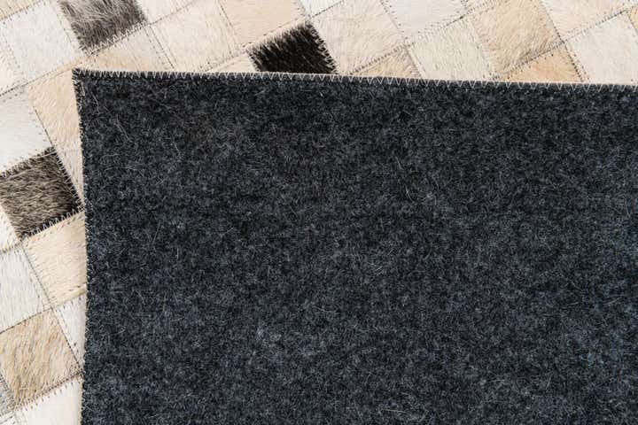 5' x 7' 11 Cowhide Stocks Rug