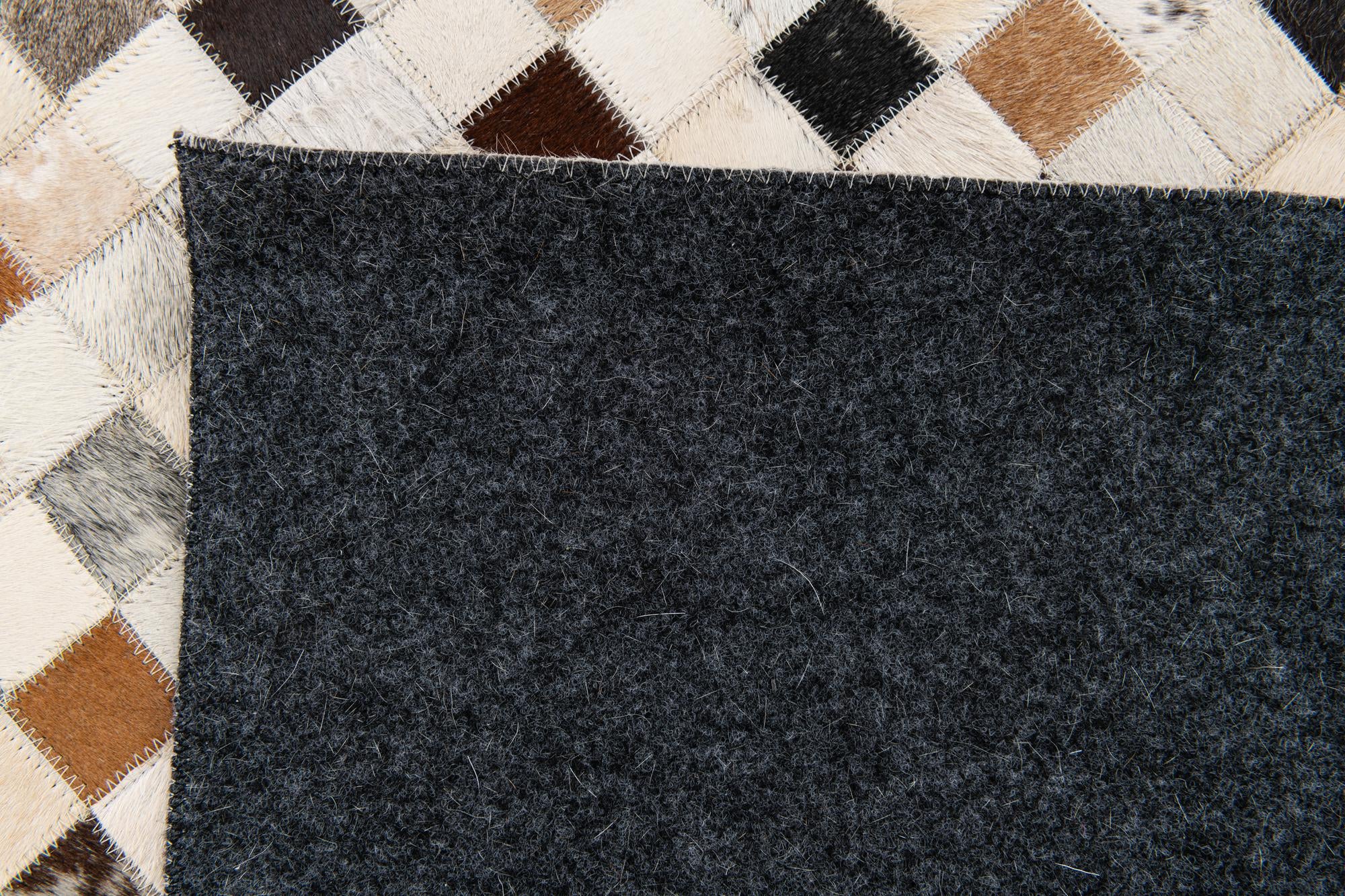 5' x 7' 10 Cowhide Stocks Rug