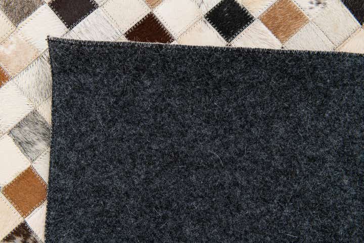 5' x 7' 10 Cowhide Stocks Rug