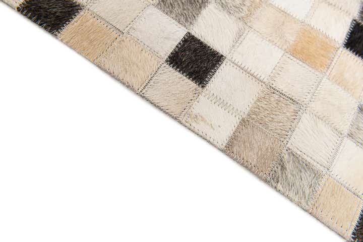 5' 1 x 7' 11 Cowhide Stocks Rug