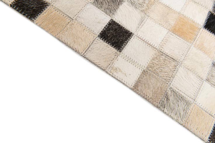 Detail image of 5' 1 x 7' 11 Cowhide Stocks Rug