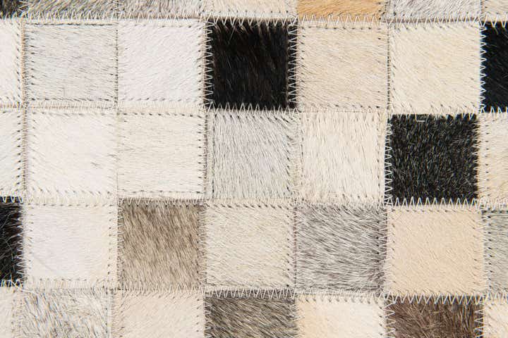 5' 1 x 7' 11 Cowhide Stocks Rug