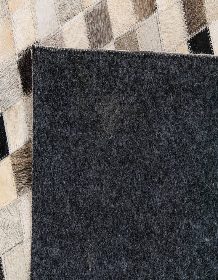 Detail image of 5' 1 x 7' 11 Cowhide Stocks Rug