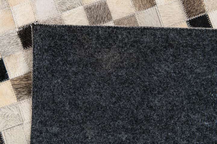 5' 1 x 7' 11 Cowhide Stocks Rug