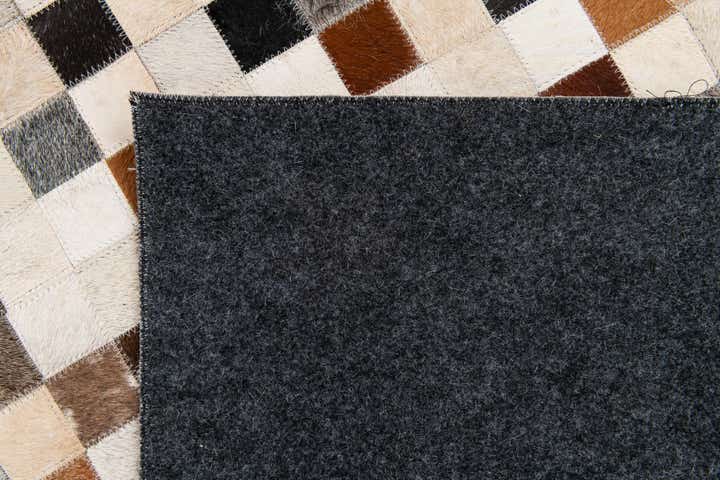 5' x 8' Cowhide Stocks Rug