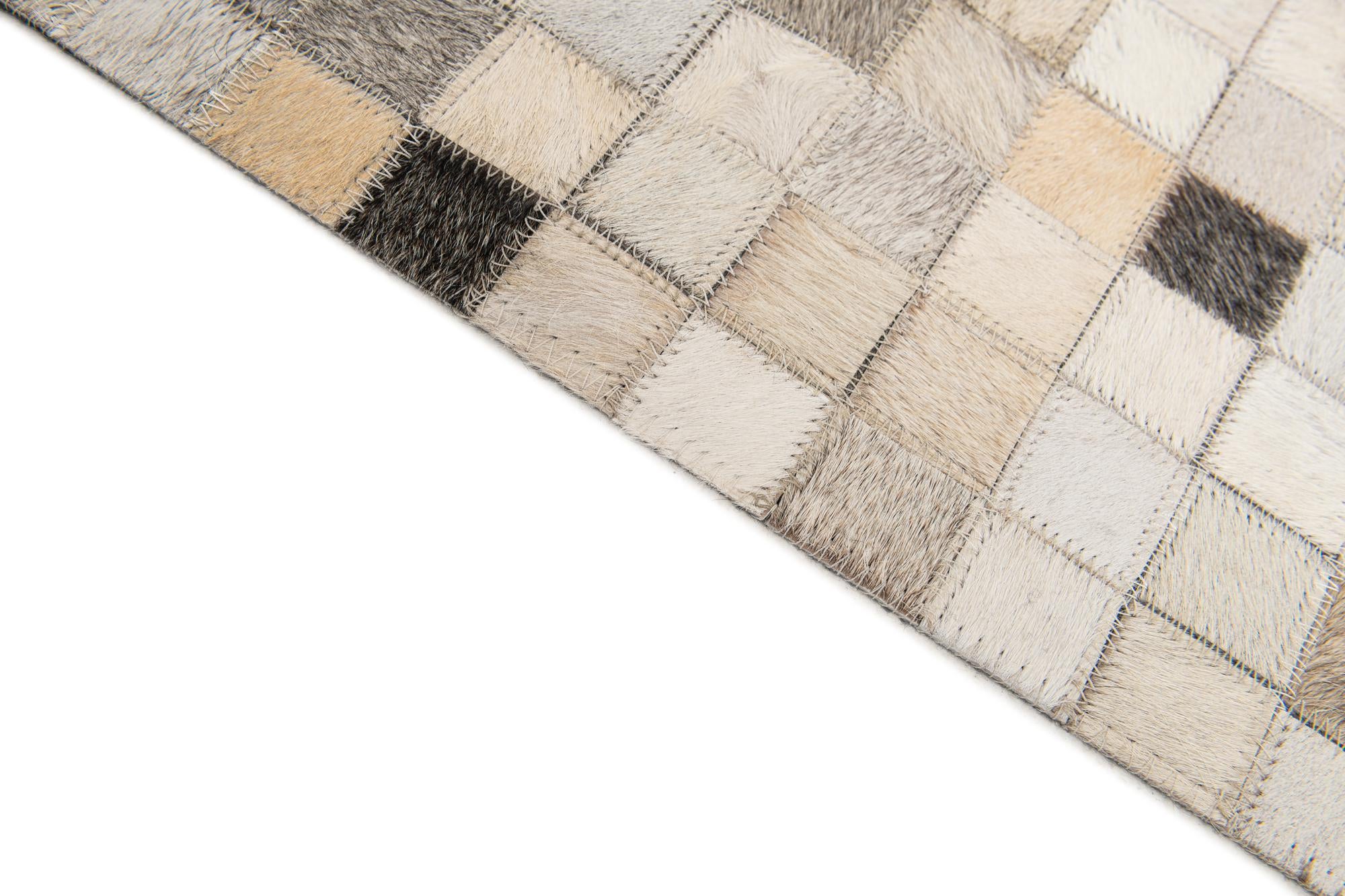 5' x 7' 11 Cowhide Stocks Rug