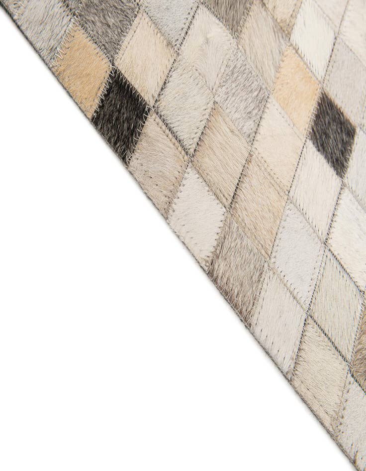 Detail image of 5' x 7' 11 Cowhide Stocks Rug