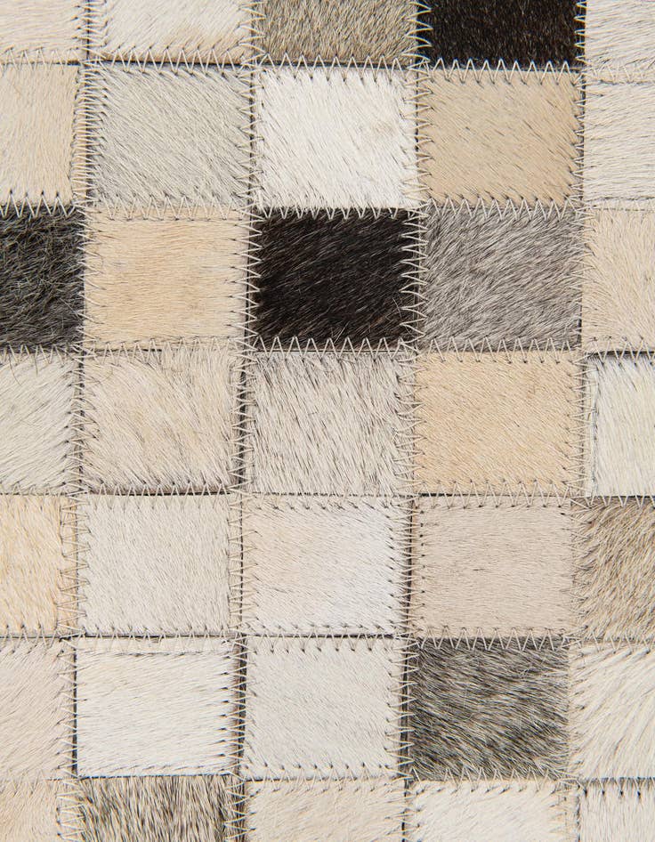 Detail image of 5' x 7' 11 Cowhide Stocks Rug