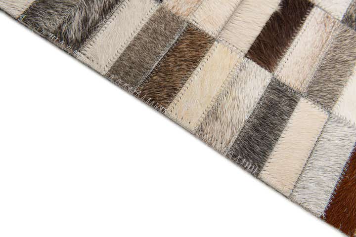 5' 1 x 7' 11 Cowhide Stocks Rug