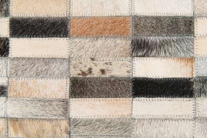 5' 1 x 7' 11 Cowhide Stocks Rug
