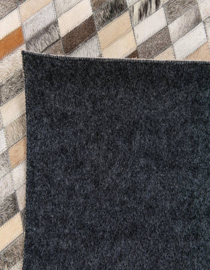 Detail image of 5' 1 x 7' 11 Cowhide Stocks Rug