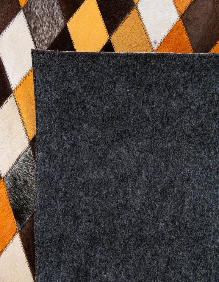 Detail image of 5' 2 x 8' Cowhide Stocks Rug