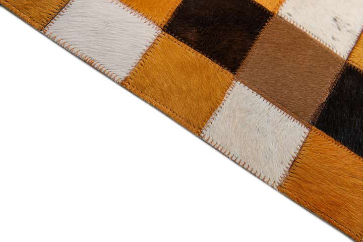 5' 2 x 8' 1 Cowhide Stocks Rug