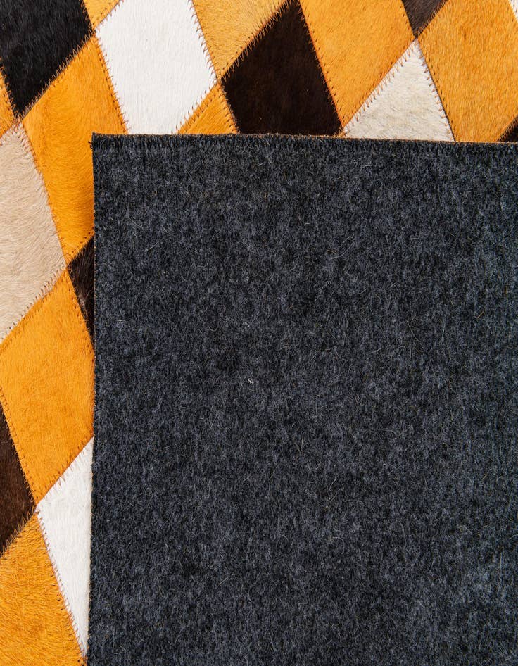 Detail image of 5' 2 x 8' 1 Cowhide Stocks Rug