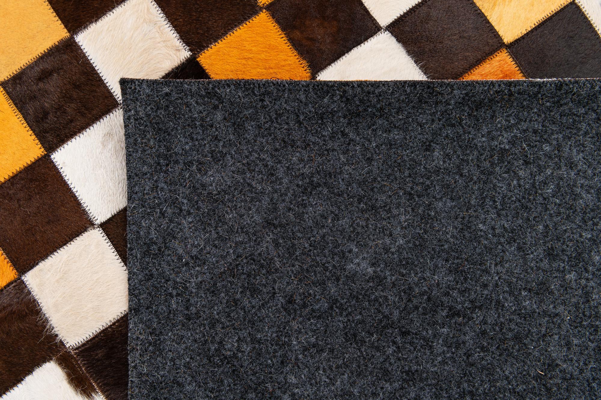 5' 2 x 8' 1 Cowhide Stocks Rug