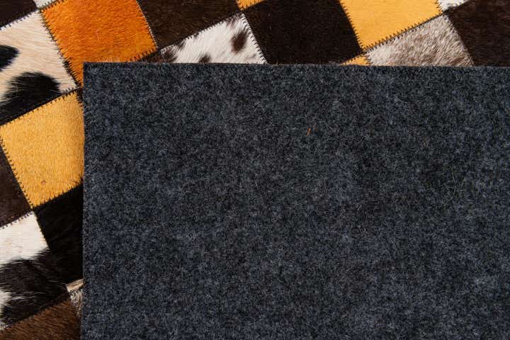 5' 2 x 8' 1 Cowhide Stocks Rug