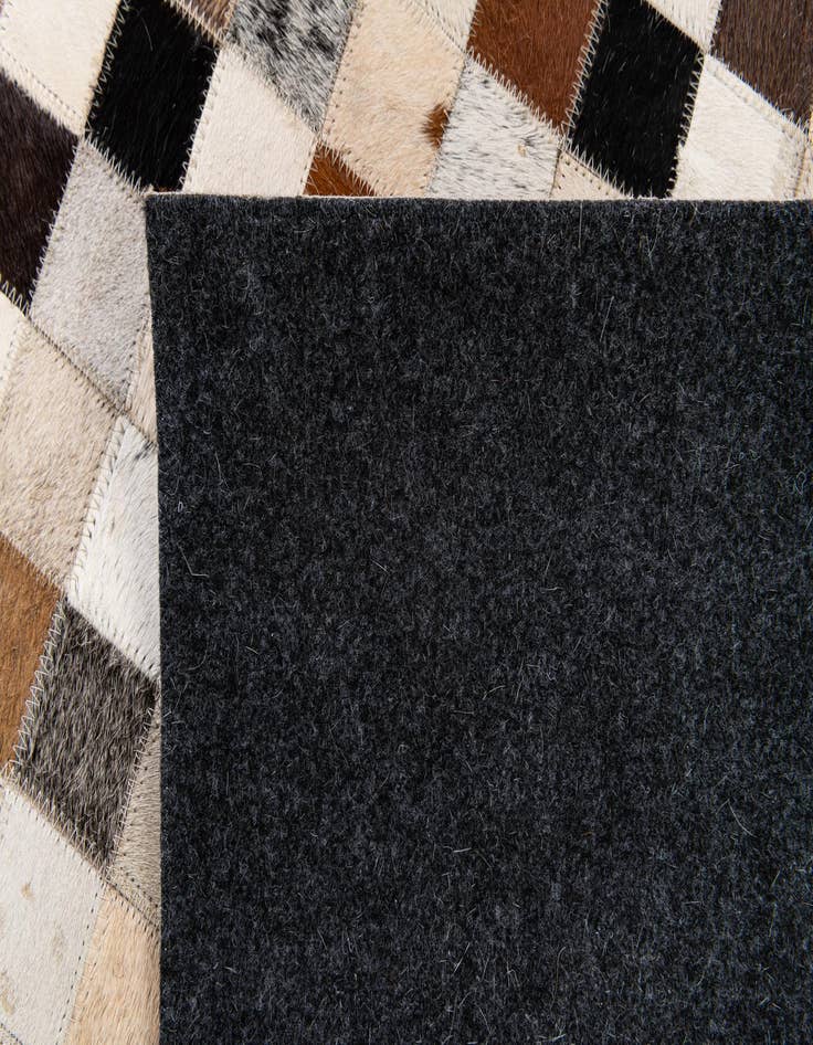 Detail image of 5' 1 x 7' 10 Cowhide Stocks Rug