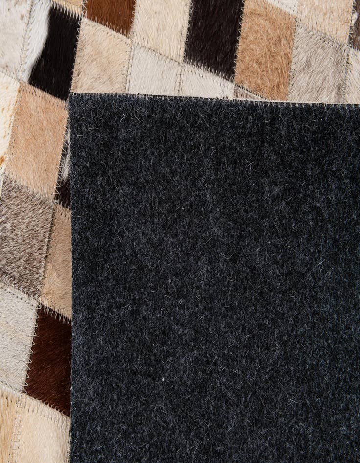 Detail image of 5' 1 x 7' 11 Cowhide Stocks Rug