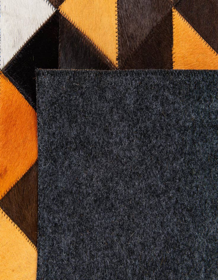 Detail image of 4' 10 x 8' 1 Cowhide Stocks Rug