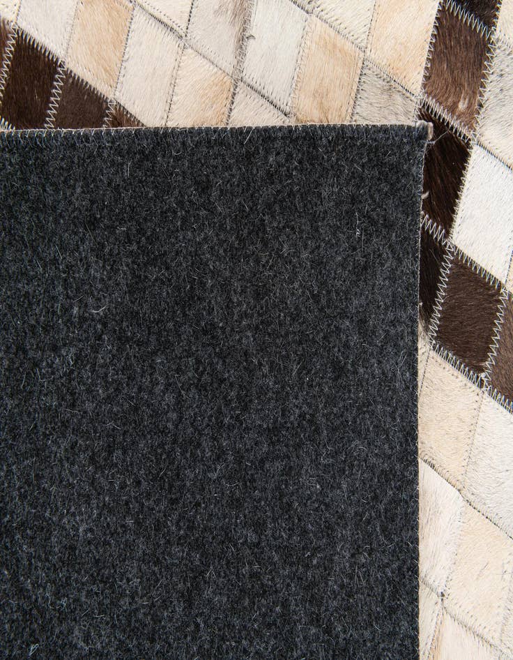 Detail image of 5' 1 x 8' Cowhide Stocks Rug