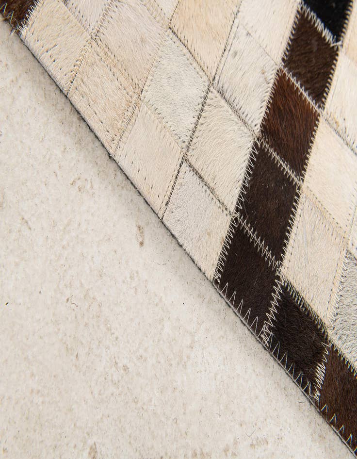 Detail image of 5' 1 x 8' Cowhide Stocks Rug