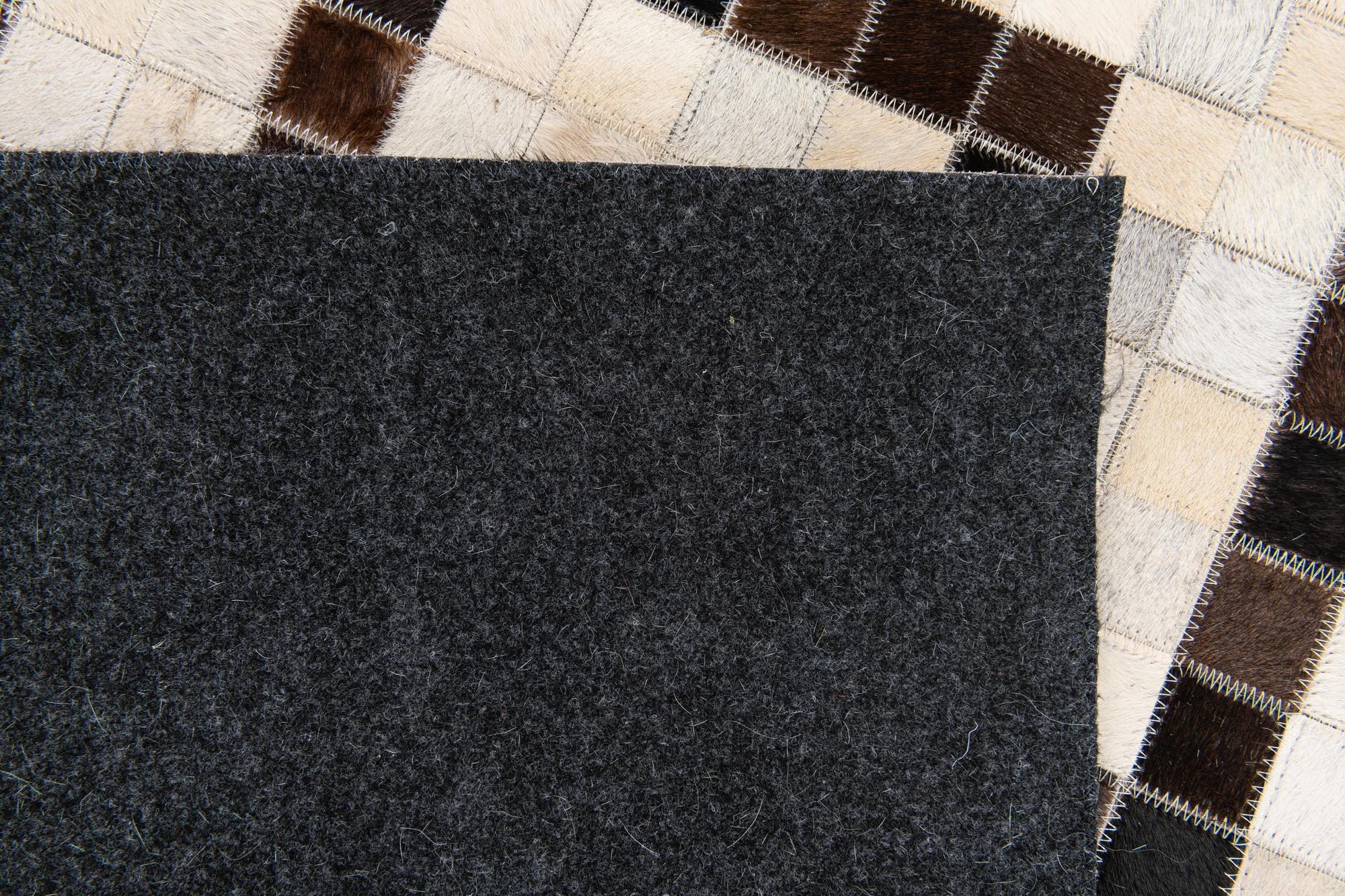 5' 1 x 8' Cowhide Stocks Rug