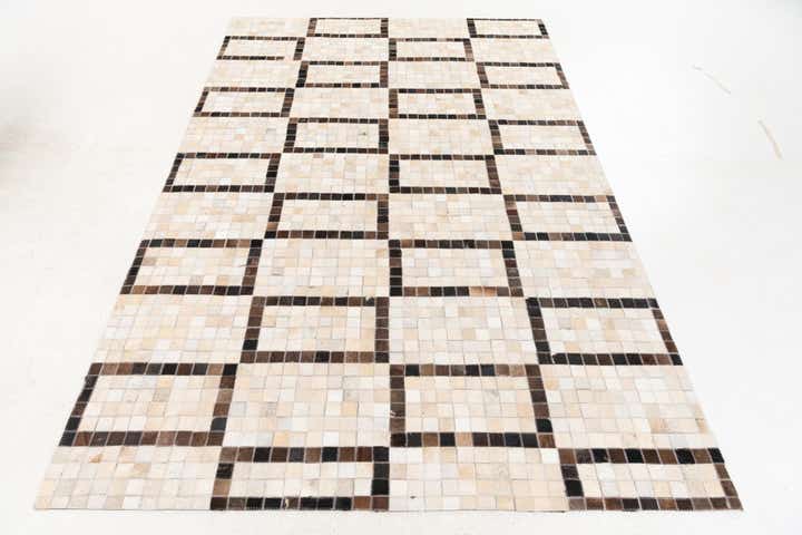 5' 1 x 8' Cowhide Stocks Rug