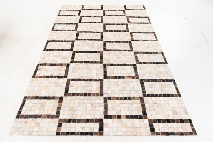 Detail image of 5' 1 x 8' Cowhide Stocks Rug