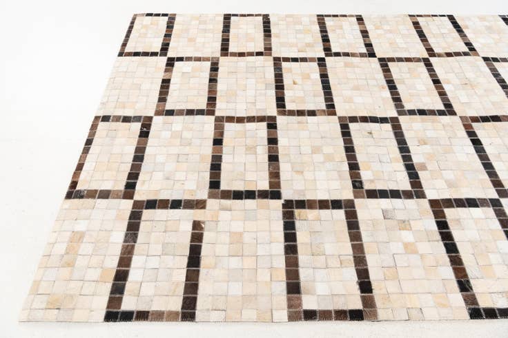Detail image of 5' 1 x 8' Cowhide Stocks Rug