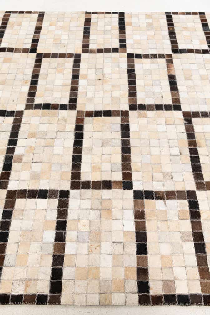 5' 1 x 8' Cowhide Stocks Rug