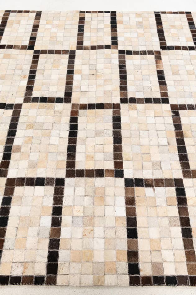 Detail image of 5' 1 x 8' Cowhide Stocks Rug