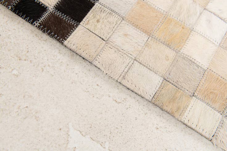 Detail image of 5' 1 x 8' Cowhide Stocks Rug