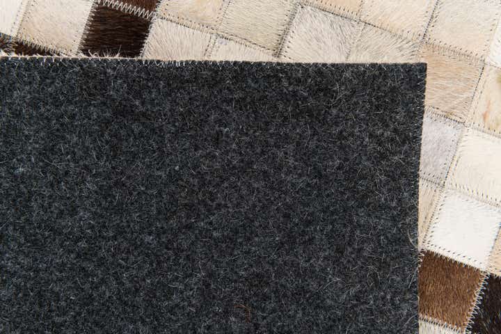 5' 1 x 8' Cowhide Stocks Rug