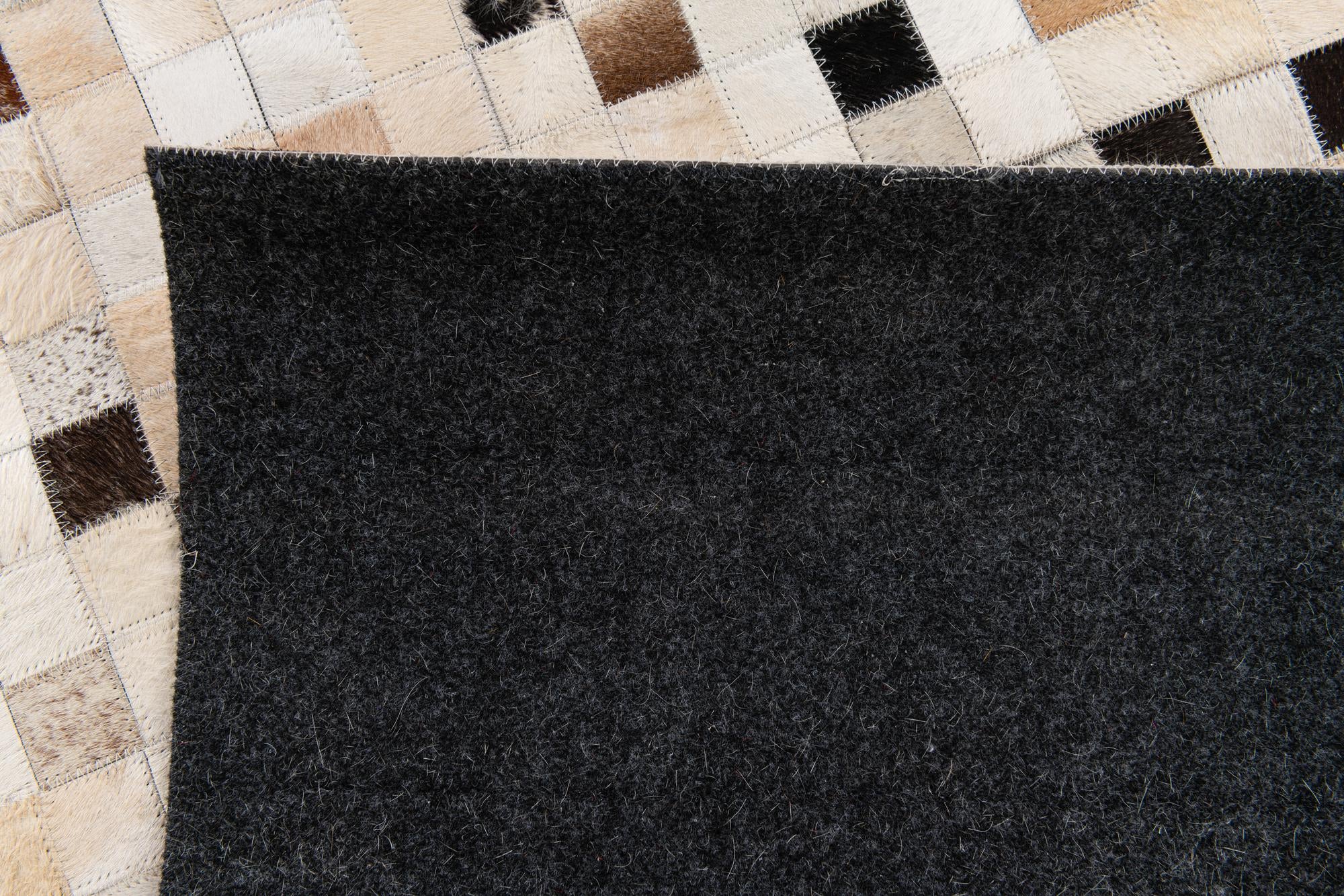 5' 2 x 7' 11 Cowhide Stocks Rug