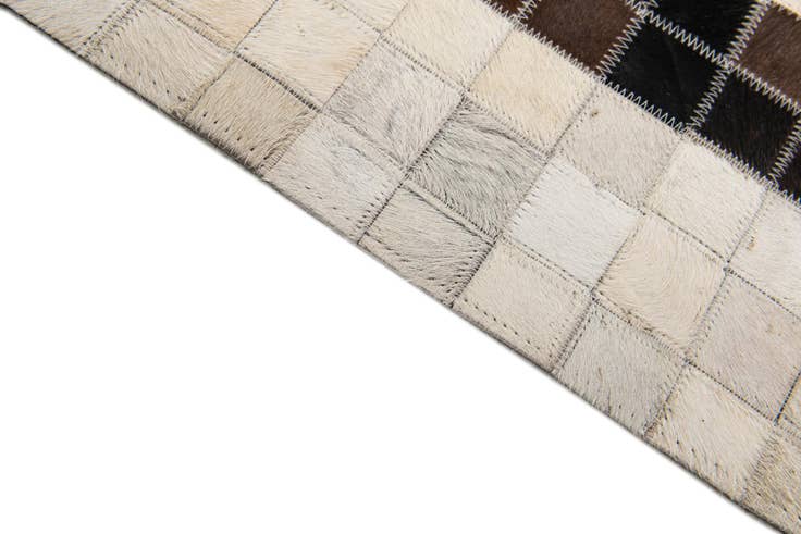 Detail image of 5' 1 x 8' Cowhide Stocks Rug