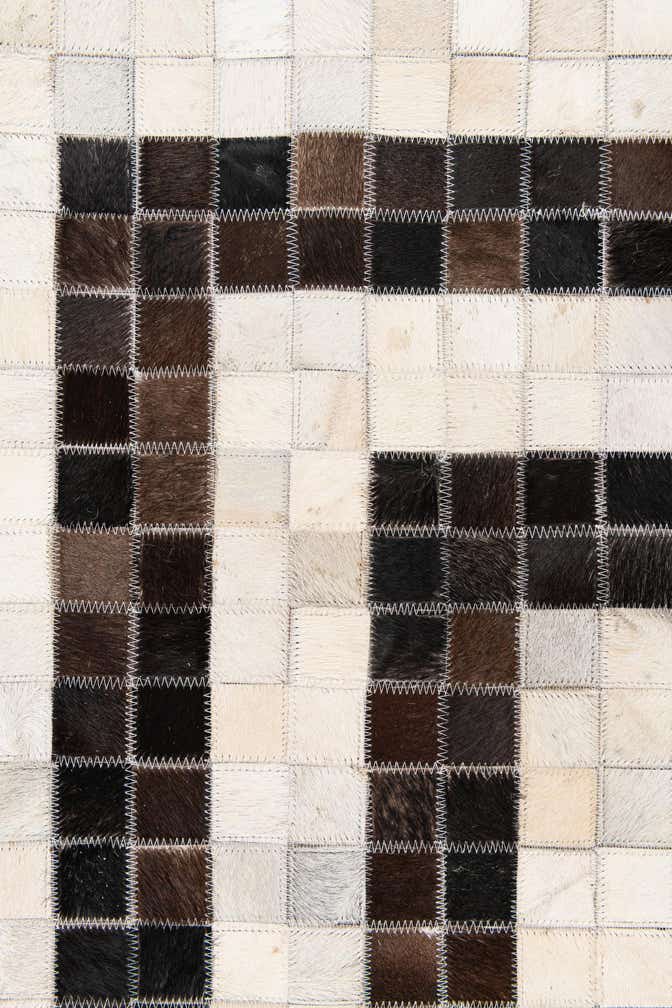 5' 1 x 8' Cowhide Stocks Rug