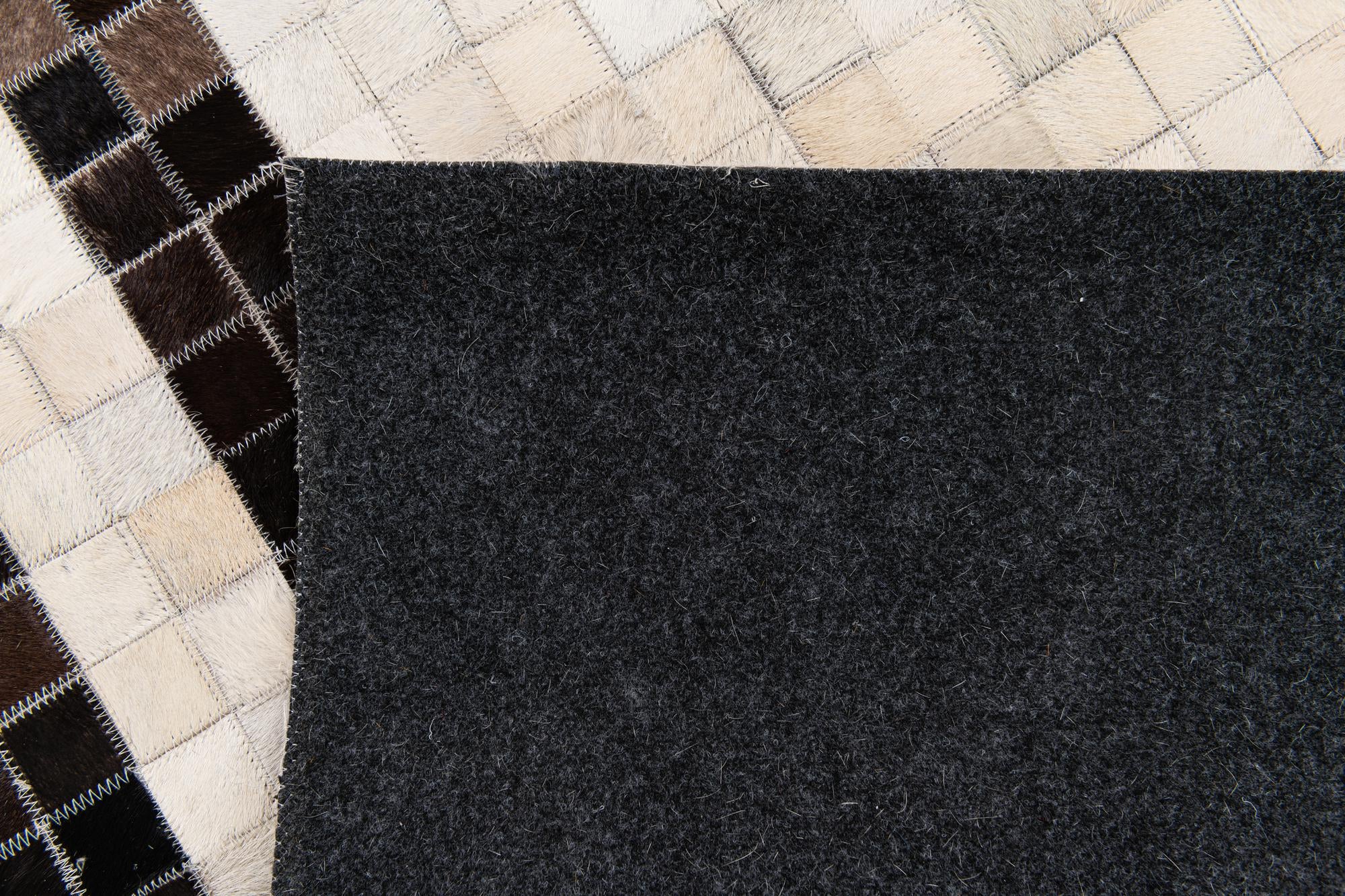 5' 1 x 8' Cowhide Stocks Rug