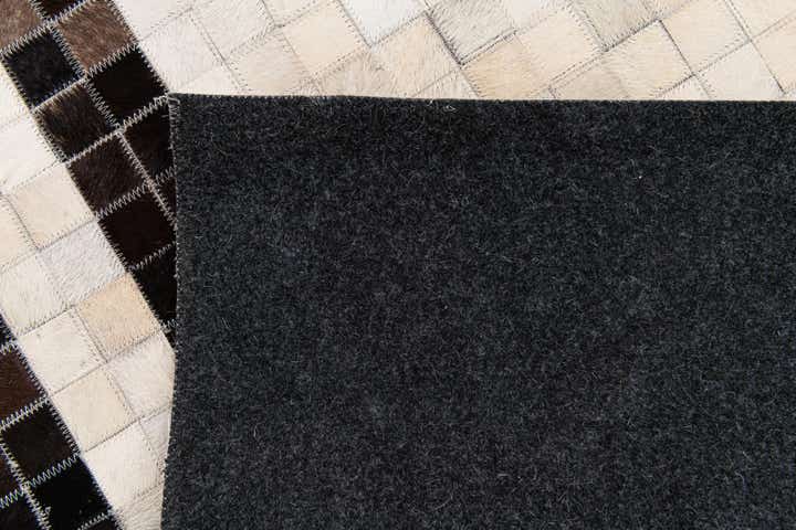 5' 1 x 8' Cowhide Stocks Rug