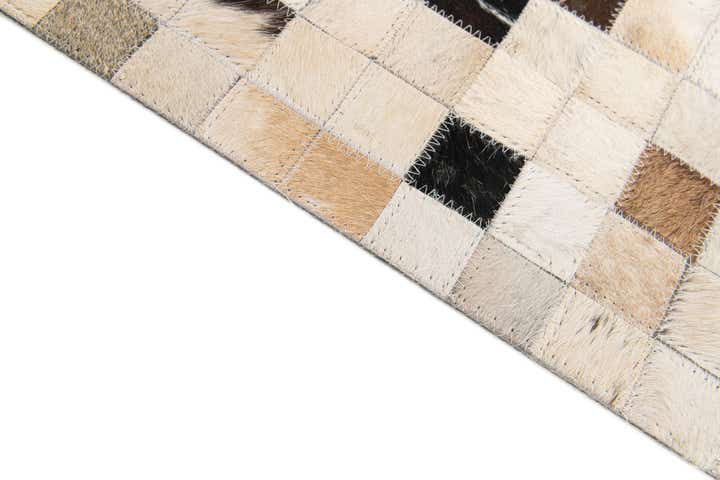 5' x 7' 11 Cowhide Stocks Rug