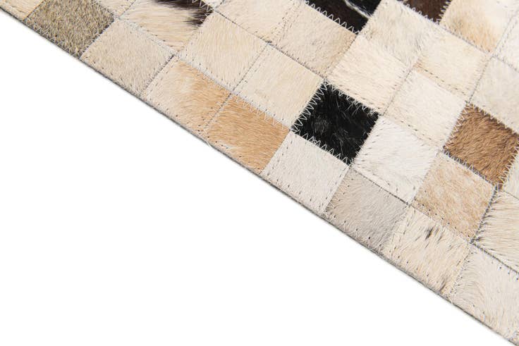 Detail image of 5' x 7' 11 Cowhide Stocks Rug
