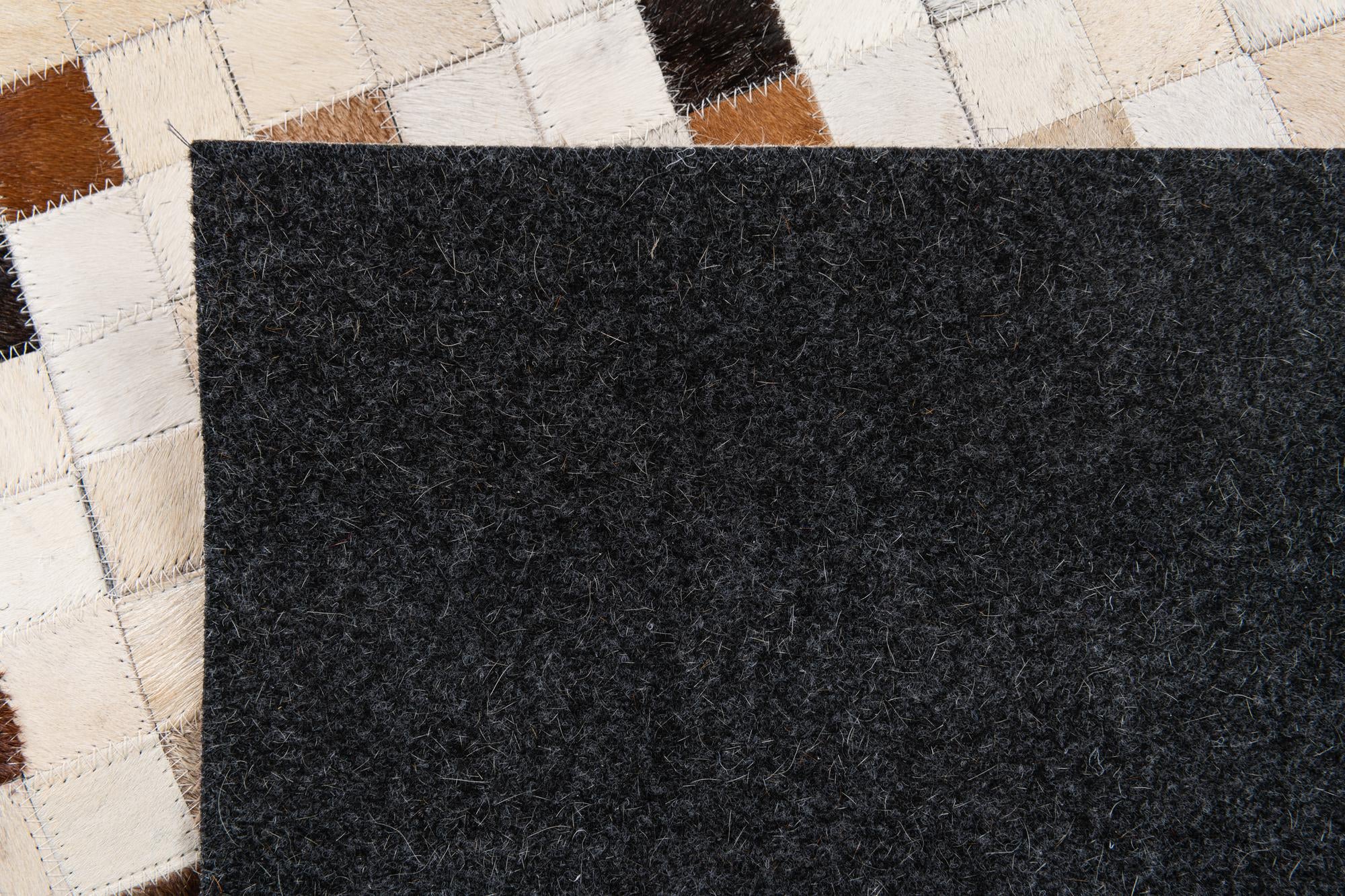 5' x 7' 11 Cowhide Stocks Rug