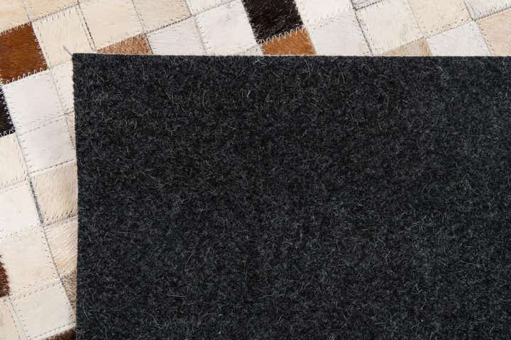 5' x 7' 11 Cowhide Stocks Rug